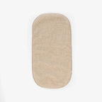 Wollen onderlegger - Matrasbeschermer wieg en kinderwagen - Scheerwol - Beige - Alwero - verpakking