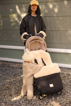 Fußsack Puffmuff® - Merino Lammfell - Noir + Milk - BINIBAMBA