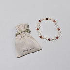 Pearly Caramel Bracelet – Bracelet pour femme avec perles d'eau douce et ambre caramel – Nirrimis