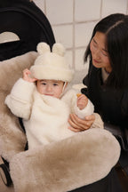 Toast Puffmuff – Luxus-Kinderwagenfußsack aus Merino-Lammfell – BINIBAMBA